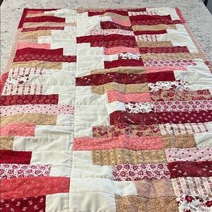 Patchwork Quilt in Red, Pink, and Tan